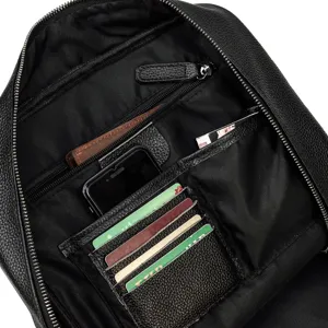 leather backpack interior detail multi-functional pockets with card slots black travel