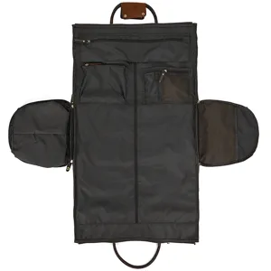 Detail shot of the unfolding travel garment bag showing multiple pockets and zippers clearly.