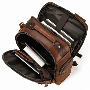 Vintage crazy horse leather backpack interior detail, large capacity laptop compartment design.