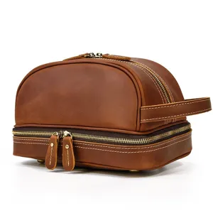 Vintage crazy horse leather toiletry bag with double zipper and side handle detail