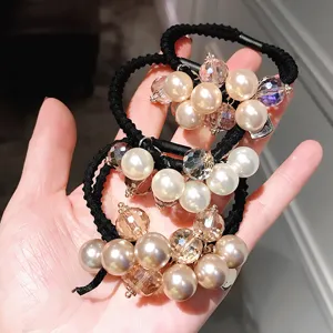 Élégants élastiques à cheveux perles et cristaux pour femmes, chouchous noirs et accessoires mignons.