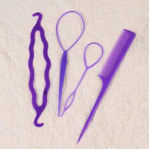 Close-up detail of purple hair styling tools set including loop needles, twist maker and comb.