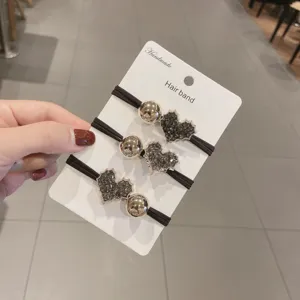 Korean style rhinestone heart hair ties set of 3 with metal beads for women and girls daily wear.
