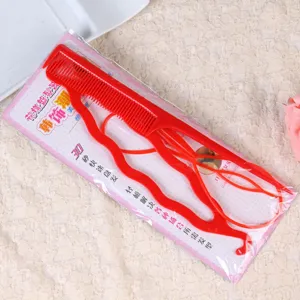 Detailed view of the red plastic hair bun maker tool set with comb and styling accessories.