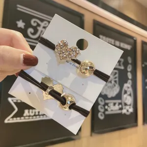 Korean style crystal heart hair tie set with elegant metal ball accents, high elasticity.
