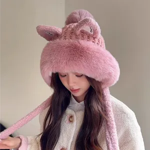 Cute plush cat ear knit hat for women, thick warm winter beanie with earflaps and pompom.