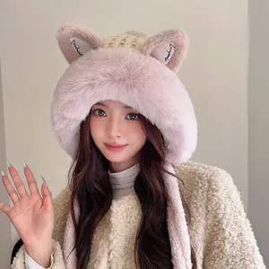 Close-up detail of the cute plush cat ear knit hat, winter warm furry beanie with earflaps.