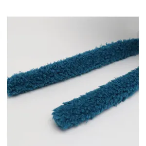 Plush knit hat detail view showcasing soft blue sherpa texture and cozy winter warmth design.