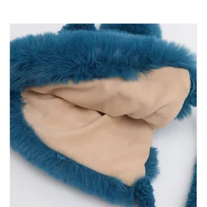 Detailed view of the plush warm winter hat with cozy fleece lining and cute fox ears design.