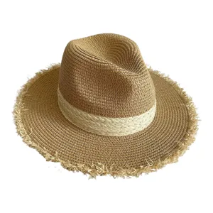 Resort style color block straw hat detail, natural woven texture with frayed flat brim.