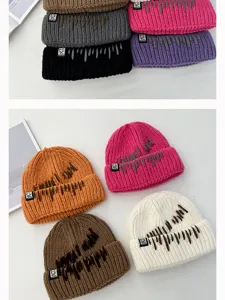 Korean style thick knitted beanie for women, warm winter slouchy hat with unique stitching details.