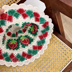 Handmade crochet strawberry bucket hat, sweet pastoral style floral knit hat detail view.