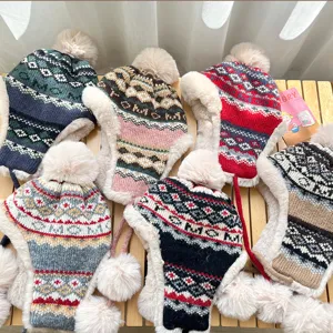 Knitted pom pom trapper hat winter warm plush earflap bomber hat with braided ties.