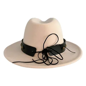 Detailed view of a stylish beige fedora hat featuring a black leather band and rope tie.