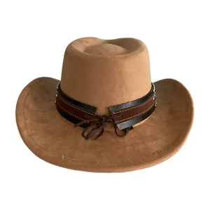 Close-up of retro brown suede cowboy hat featuring layered leather band and bow detail.