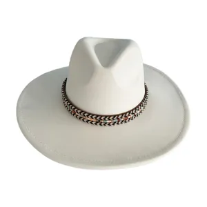 Close-up detail of white faux suede fedora hat with bohemian braided band and wide brim.