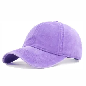 Detailed view of a vintage washed purple cotton baseball cap with curved brim and texture.