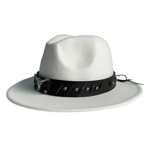 Close-up details of the white fedora hat with black leather band, metallic bull head, and studs.