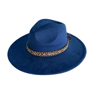 Close-up detail of blue faux suede fedora hat, showcasing soft texture and tribal woven band.
