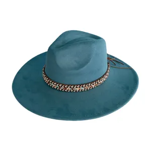 Detailed view of the turquoise suede fedora hat featuring a woven decorative band and side leather ties.