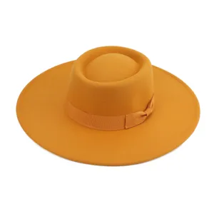 Sombrero fedora de lana naranja con lazo elegante, diseño de ala plana estilo vintage.