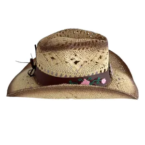 Vintage straw western cowboy hat with hollow breathable design and elegant floral embroidery details.