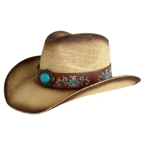 Gros plan sur le ruban vintage turquoise avec broderie et la texture de paille.