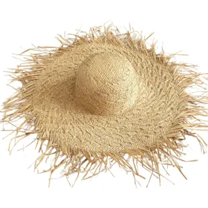Wide brim raffia straw hat with frayed raw edges for summer beach sun protection.