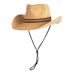 Gedetailleerd close-up van de zomerse strooien cowboyhoed met stijlvolle geweven band.