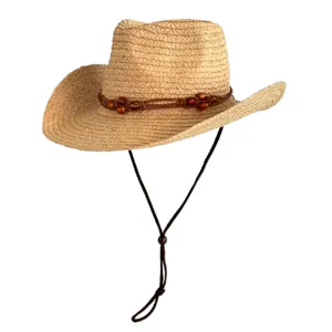 Gevlochten strooien cowboyhoed voor zomervakantie op het strand en dagelijks gebruik.