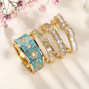Vintage hofstijl 4-in-1 ringenset met blauwe emaillen bloem en schitterende zirkonia's.