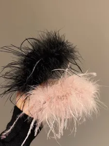 Fluffy feather hair claw clip, elegant ostrich feather shark clip for women and girls styling.