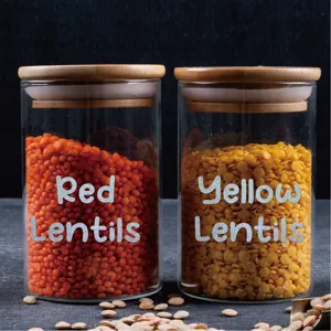 Bocaux en verre décoratifs avec des autocollants lettres brillants pour lentilles.