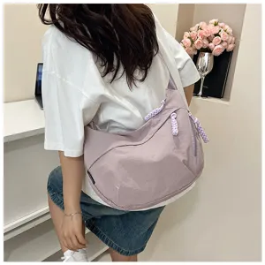 Sac bandoulière hobo en nylon décontracté pour femmes, sac fourre-tout simple du quotidien.