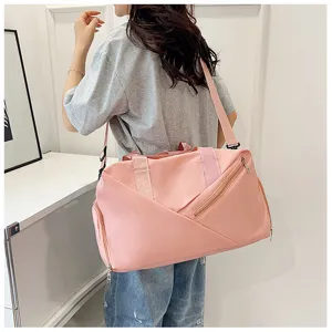 Grand sac de voyage rose pour le sport, le yoga et l'entrainement avec separation.