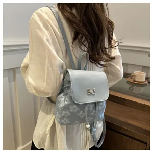 Mini sac à dos floral bleu clair pour femme, élégant petit sac à bandoulière papillon.
