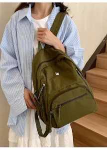 Sac à dos en nylon vert décontracté avec poches zippées, sac de voyage élégant et pratique