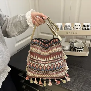 Ethnic style tassel canvas crossbody bag women vintage retro woven shoulder bag detailed view