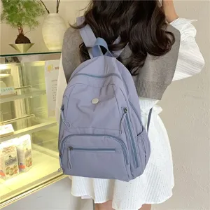 Sac à dos de voyage décontracté minimaliste, grande capacité, léger et pratique pour le quotidien.