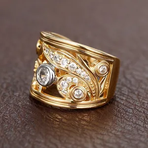Detailed close-up of wide hollow leaf pattern two-tone zircon ring sparkling design.