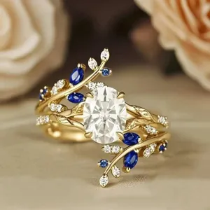 Exquisite copper micro-paved zircon ring featuring creative leaf design with elegant center oval stone.