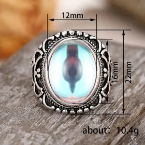 Vintage palace style ornate carved silver ring with light blue stone size details and weight.