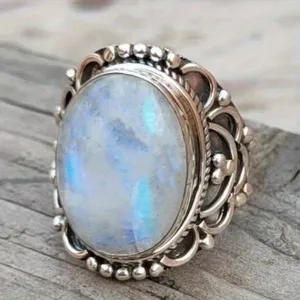 Vintage Moonstone Ring Detailed View, Ornate Silver Carved Band, Niche Design Jewelry.