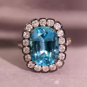 Anillo gotico chapado en oro negro con un impresionante diseno de halo de circoinia azul mujer