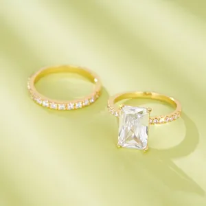 Conjunto de anillos elegantes de circonita cubica talla esmeralda chapado en oro.