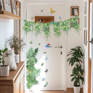 Autocollants muraux plantes vertes tropicales papillons vue détail salon chambre décoration.