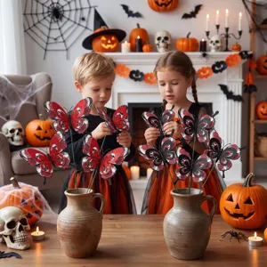 Halloween butterfly garden stakes with glitter skull pattern for outdoor lawn decor.