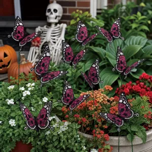 Detailed view of Halloween skull butterfly garden stakes, adding spooky yard decor charm.