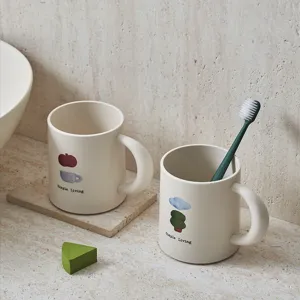 Minimalist couple mouthwash cups set with cute print illustrations for daily bathroom use.