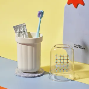 Portable travel toothbrush case set with toothpaste and brush for business trips and tours.